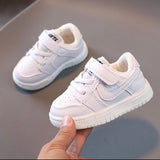 White Velcro casual trainers