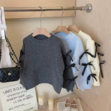 Knitted bow sleeve jumper