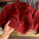 Berry bow Christmas jumper