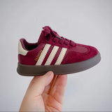 Burgundy & white striped kids trainers