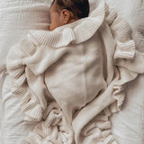 Knitted newborn baby blanket